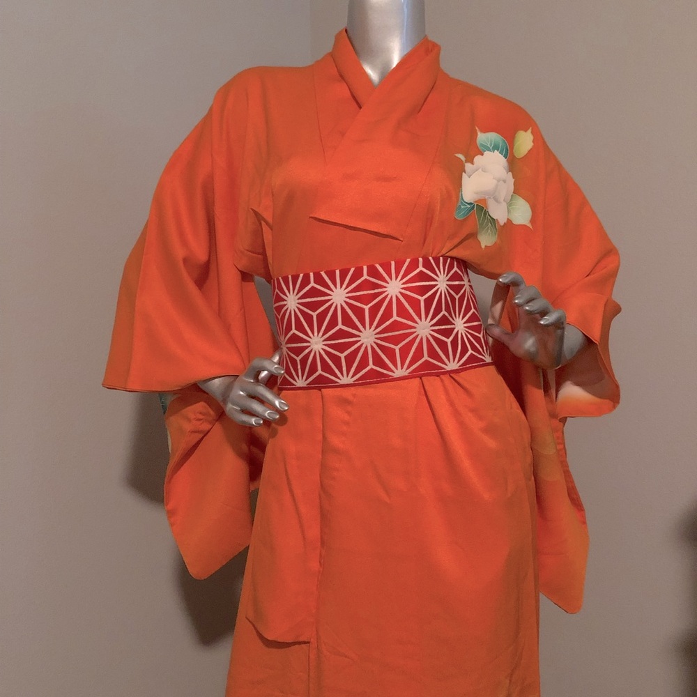 Authentic light kimono in orange with flowers